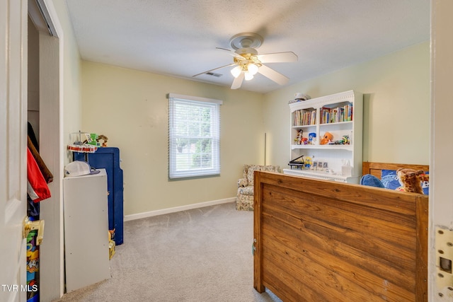 bedroom featuring ceiling fan, carpet floors, visible vents, and baseboards