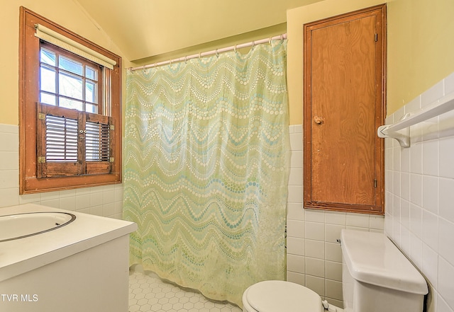415 Fairgrounds Rd, Greeneville, TN 37745 - bathroom with curtained shower, toilet, tile walls, and vanity