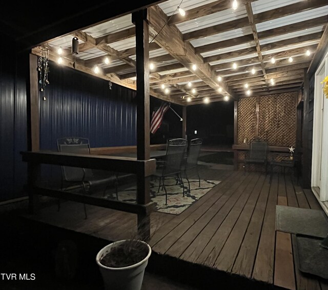 wooden terrace featuring outdoor dining space