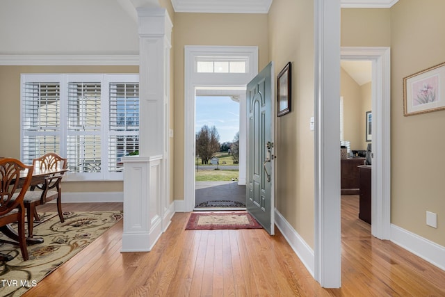 20324 Josh Allen Dr, Abingdon, VA 24211 - entrance foyer featuring decorative columns, light wood-style flooring, and ornamental molding
