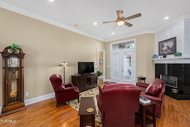 20324 Josh Allen Dr, Abingdon, VA 24211 - living room with light wood-style flooring, a tile fireplace, crown molding, and ceiling fan
