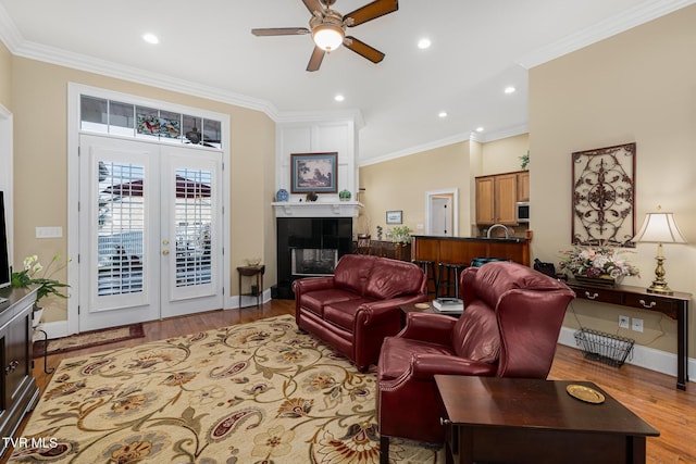 20324 Josh Allen Dr, Abingdon, VA 24211 - living room with a tiled fireplace, a ceiling fan, and ornamental molding
