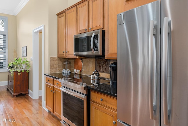 20324 Josh Allen Dr, Abingdon, VA 24211 - kitchen featuring baseboards, light wood-style flooring, stainless steel appliances, decorative backsplash, and crown molding