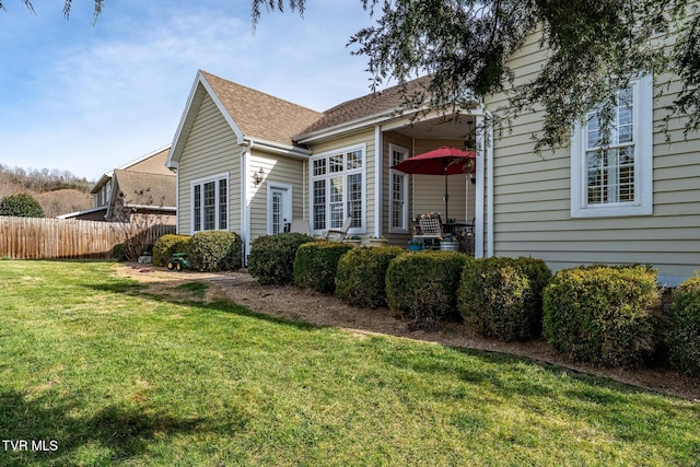20324 Josh Allen Dr, Abingdon, VA 24211 - rear view of property featuring a yard, a shingled roof, and fence