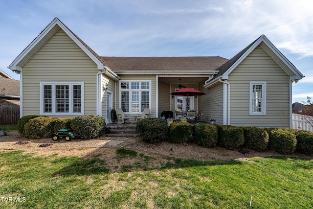 20324 Josh Allen Dr, Abingdon, VA 24211 - rear view of property featuring a lawn, fence, and a shingled roof