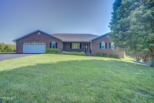 142 Laurel Acres Ct, Jonesborough, TN 37659 - single story home featuring brick siding, a front yard, an attached garage, and driveway