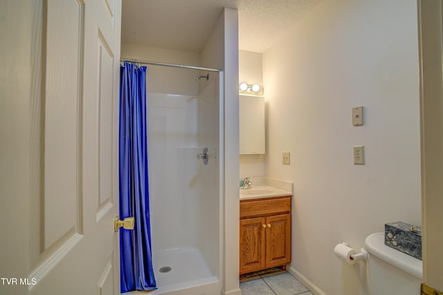 142 Laurel Acres Ct, Jonesborough, TN 37659 - bathroom featuring tile patterned flooring, a shower stall, vanity, and a textured ceiling