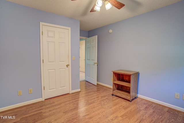 142 Laurel Acres Ct, Jonesborough, TN 37659 - unfurnished bedroom with wood finished floors, ceiling fan, and a textured ceiling