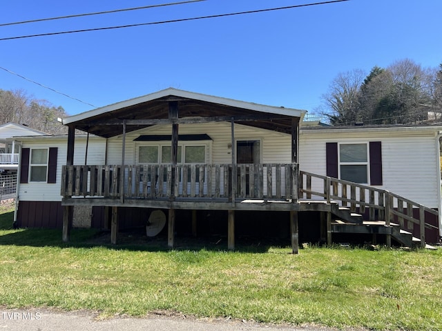 157 Power House Holw, Clintwood, VA 24228 - rear view of property with a lawn and a wooden deck