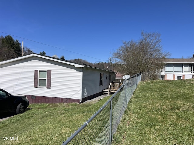 157 Power House Holw, Clintwood, VA 24228 - view of side of property with a yard and fence