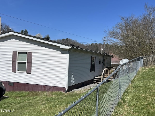157 Power House Holw, Clintwood, VA 24228 - view of side of home featuring a fenced backyard and a lawn