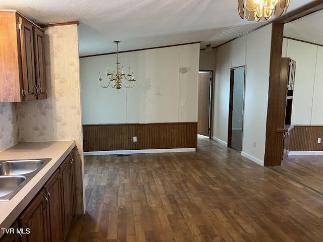 157 Power House Holw, Clintwood, VA 24228 - kitchen featuring dark wood-style floors, pendant lighting, a chandelier, and light countertops