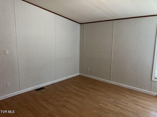 157 Power House Holw, Clintwood, VA 24228 - unfurnished room featuring visible vents, baseboards, and wood finished floors