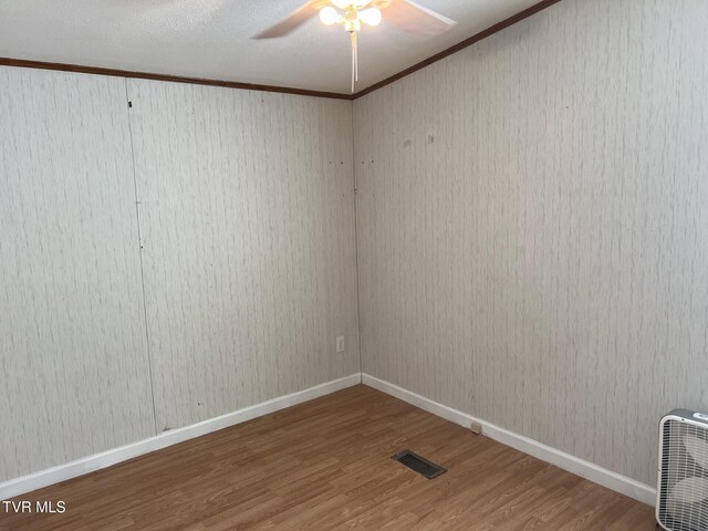 157 Power House Holw, Clintwood, VA 24228 - empty room featuring visible vents, baseboards, a ceiling fan, and wood finished floors