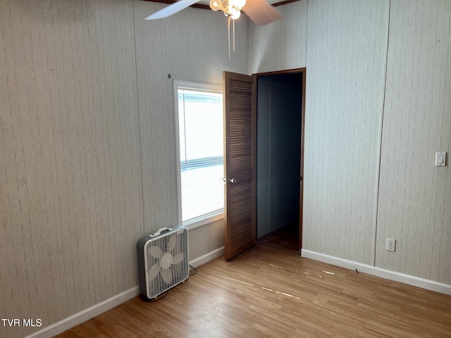 157 Power House Holw, Clintwood, VA 24228 - unfurnished bedroom featuring a ceiling fan, baseboards, and wood finished floors