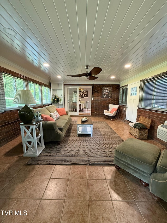 1209 Beechwood Dr, Johnson City, TN 37604 - tiled living area featuring brick wall, a ceiling fan, and ornamental molding
