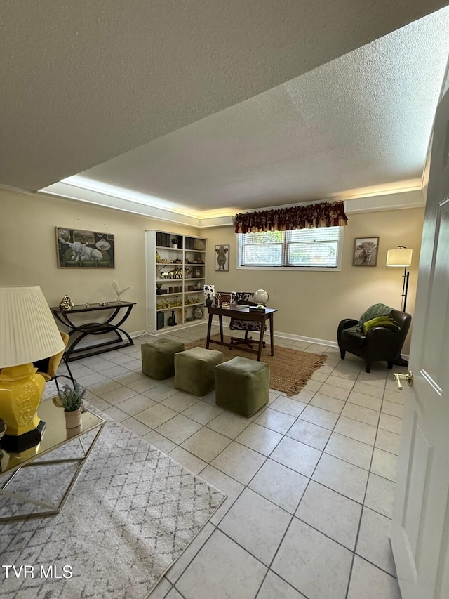 1209 Beechwood Dr, Johnson City, TN 37604 - living area with light tile patterned flooring and a textured ceiling