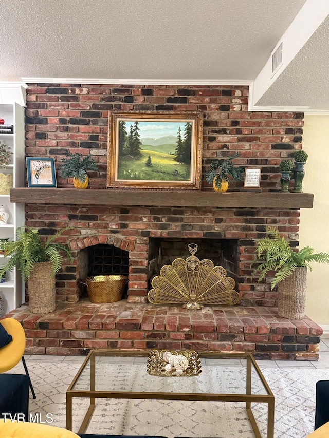 1209 Beechwood Dr, Johnson City, TN 37604 - living room featuring a fireplace, a textured ceiling, and ornamental molding
