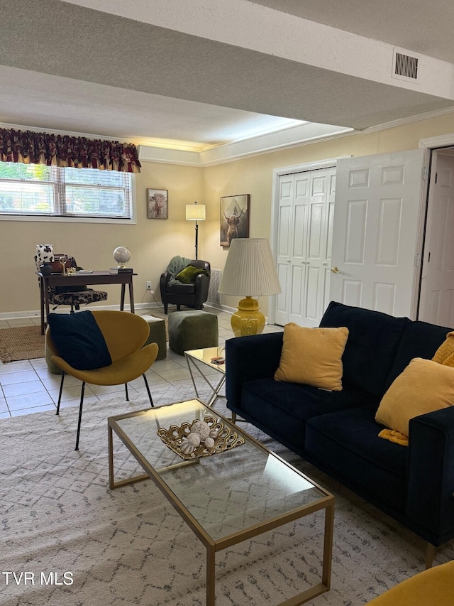 1209 Beechwood Dr, Johnson City, TN 37604 - living room with ornamental molding, baseboards, a tray ceiling, and tile patterned flooring