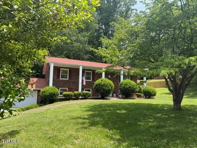 1209 Beechwood Dr, Johnson City, TN 37604 - split foyer home with a front lawn and metal roof
