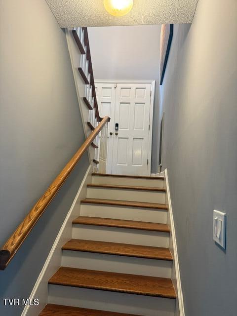 1209 Beechwood Dr, Johnson City, TN 37604 - stairway with a textured ceiling
