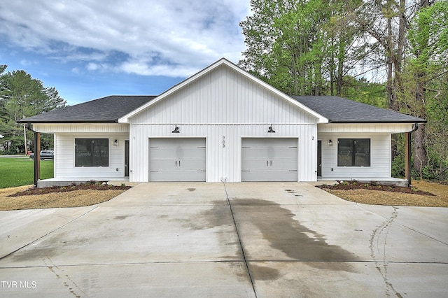 703 Swadley Rd, Johnson City, TN 37601 - view of front of home with a garage, concrete driveway, roof with shingles, and covered porch