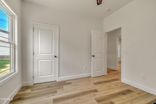 703 Swadley Rd, Johnson City, TN 37601 - unfurnished bedroom with light wood finished floors and baseboards