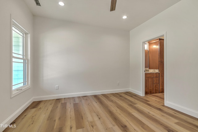 703 Swadley Rd, Johnson City, TN 37601 - spare room featuring plenty of natural light, light wood-type flooring, baseboards, and recessed lighting