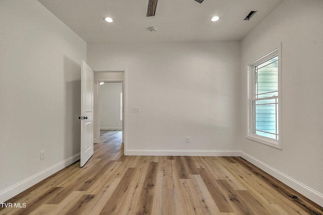 703 Swadley Rd, Johnson City, TN 37601 - unfurnished room featuring plenty of natural light, light wood-type flooring, recessed lighting, and baseboards