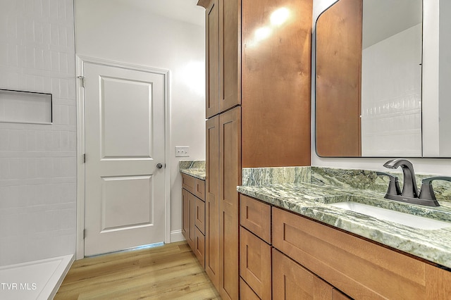 703 Swadley Rd, Johnson City, TN 37601 - bathroom with wood finished floors and vanity