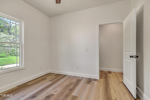 703 Swadley Rd, Johnson City, TN 37601 - unfurnished room with healthy amount of natural light, light wood-style floors, and baseboards
