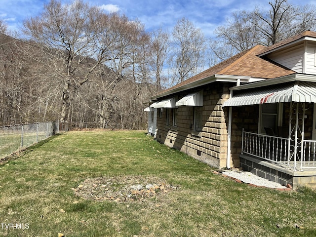 view of yard featuring fence