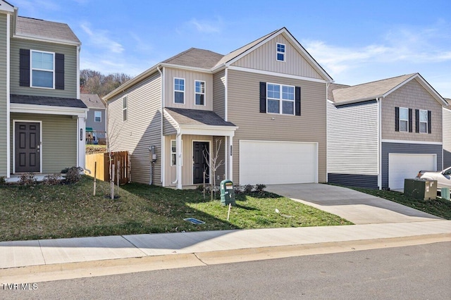 view of front facade featuring fence, a garage, a front yard, board and batten siding, and driveway