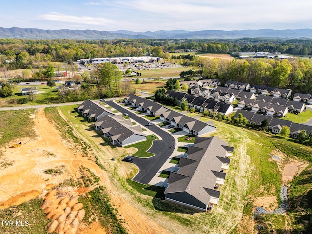 aerial perspective of suburban area featuring a mountain backdrop