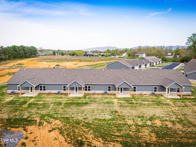 view from above of property featuring a mountainous background