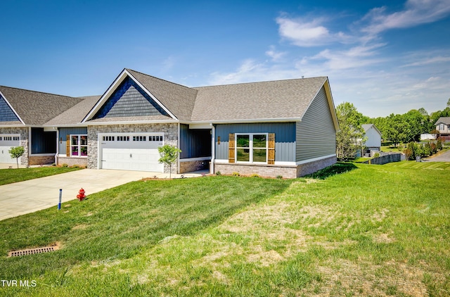 view of front of house with a garage, driveway, roof with shingles, and a front lawn