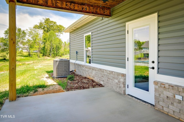 view of patio with central AC unit