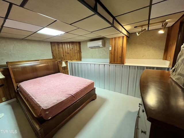 417 Charlie Hicks Rd, Jonesborough, TN 37659 - bedroom with an AC wall unit, a textured wall, and a wainscoted wall