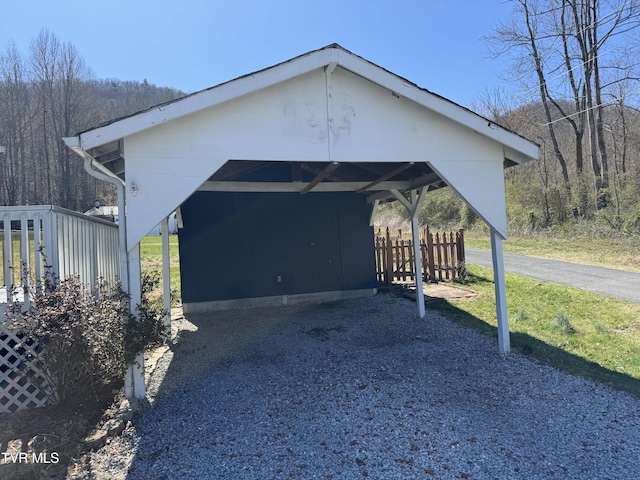 exterior space featuring driveway and a carport