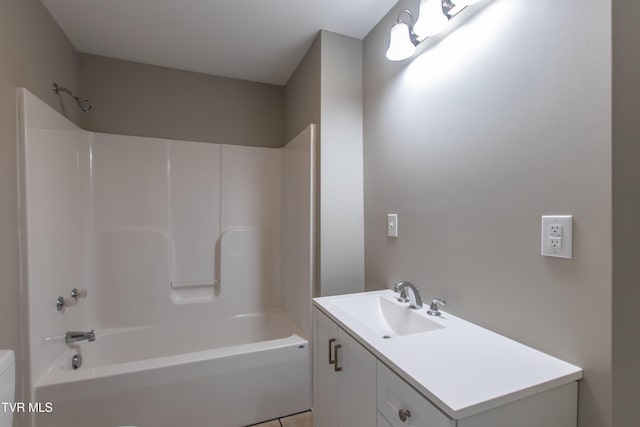 full bath with shower / bath combination, vanity, and toilet