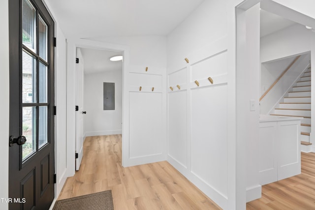 112 W Chestnut St, Johnson City, TN 37604 - hall with electric panel, a wealth of natural light, and light wood finished floors