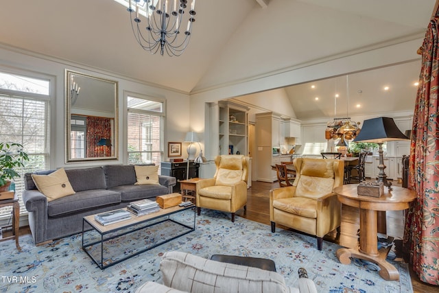 1221 Radcliffe Ave, Kingsport, TN 37664 - living area with an inviting chandelier, high vaulted ceiling, and wood finished floors
