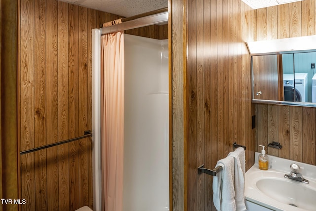 118 Starlite Dr, Greeneville, TN 37743 - full bath featuring vanity, washer / dryer, a shower with shower curtain, and wood walls
