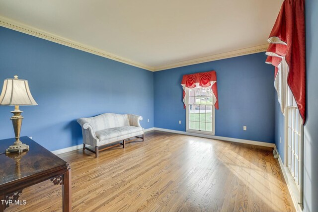 2017 Springfield Ave, Kingsport, TN 37664 - living area with baseboards, ornamental molding, and wood finished floors