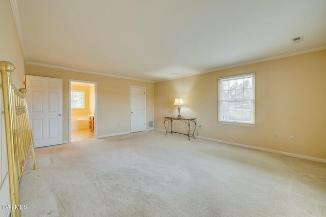 2017 Springfield Ave, Kingsport, TN 37664 - empty room featuring a healthy amount of sunlight, light colored carpet, and visible vents