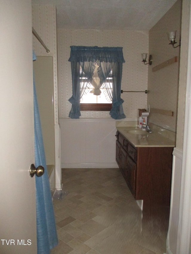 145 Rock City Rd, Kingsport, TN 37664 - bathroom featuring a wainscoted wall, wallpapered walls, and vanity