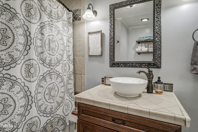 232 Meadow Dr, Bristol, TN 37620 - full bath with vanity, ornamental molding, and a textured ceiling