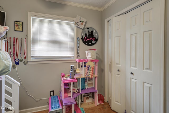 232 Meadow Dr, Bristol, TN 37620 - rec room with ornamental molding and wood finished floors