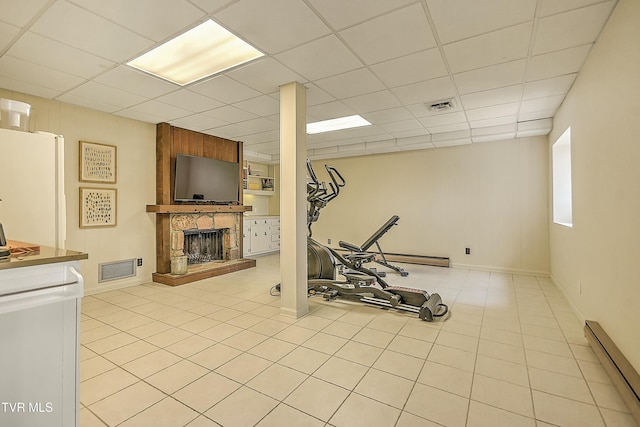 55 Grove Hill Rd, Kingsport, TN 37660 - workout room featuring visible vents, a baseboard heating unit, and a paneled ceiling