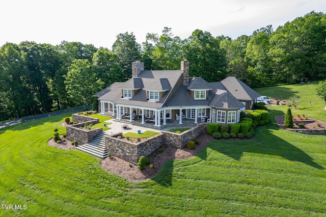 19 Summer Hill Ln, Greeneville, TN 37745 - back of house with a lawn, covered porch, and a chimney